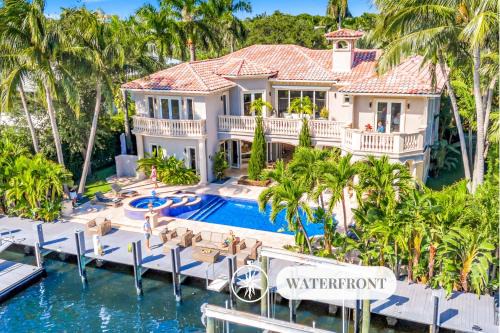 Coral Ridge Villa | Waterfront Heated Pool Canal View Access Paloma Key VlLLAS