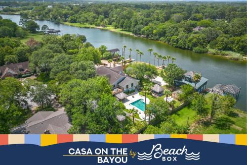 Dickinson House | Waterfront oasis with private pool, game room, fire pit and volleyball court