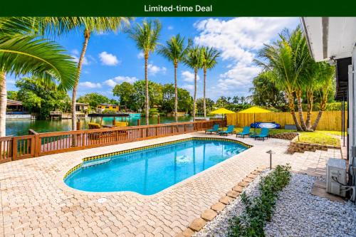 Poinsettia Heights House | Waterfront Pool Home Games, 10 min to Beach