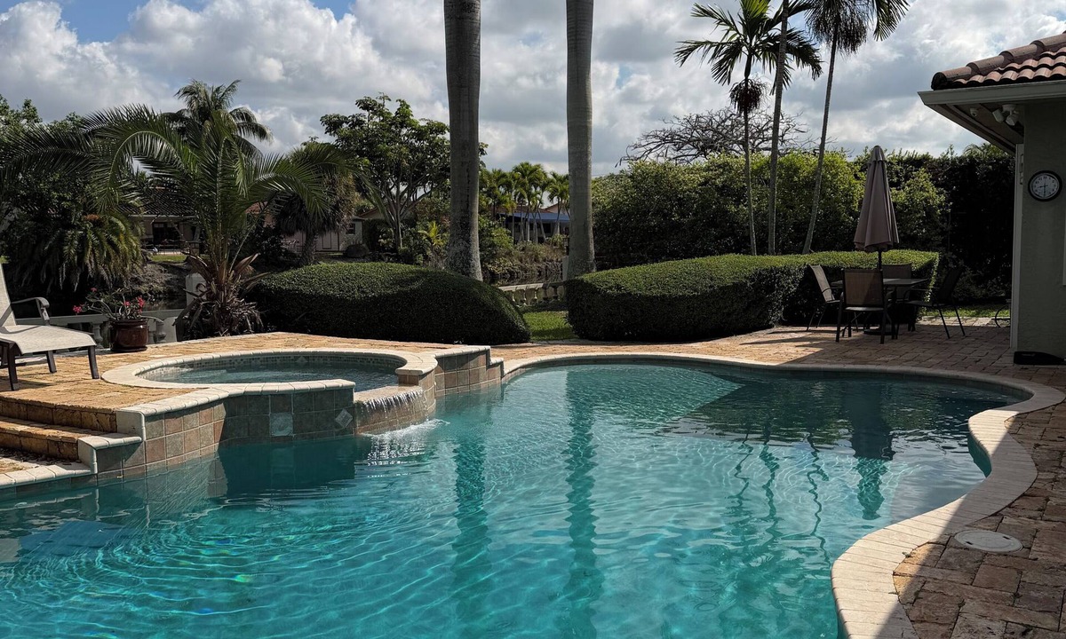 Sunset House | Waterfront Property with a resort style backyard and Heated Pool in Miami
