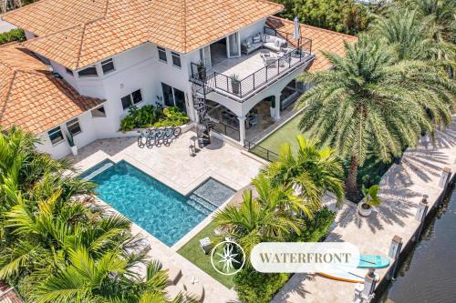 Seven Isles House | Waterfront Villa Walk to Beach Venice of America Coastal Extravagance Palm Key VlLLAS