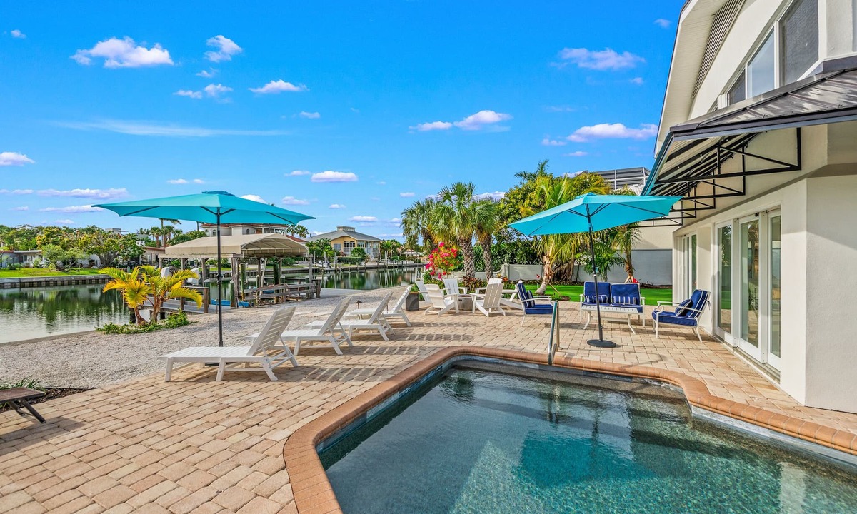 Saint Armands Key House | Waterfront w/Putting Green, Heated Pool, Dock -Manatee Cove