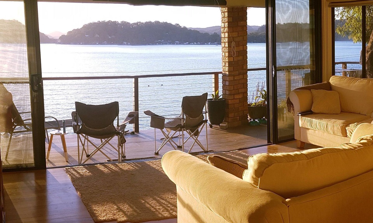 Little Wobby House | Waterfront with private jetty and sunset views. Boat access only. Pet friendly.