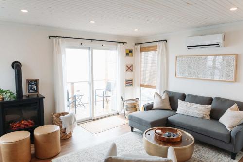 Geneva House | Waters Edge Lakefront with Kayaks Fire Pit and Dock