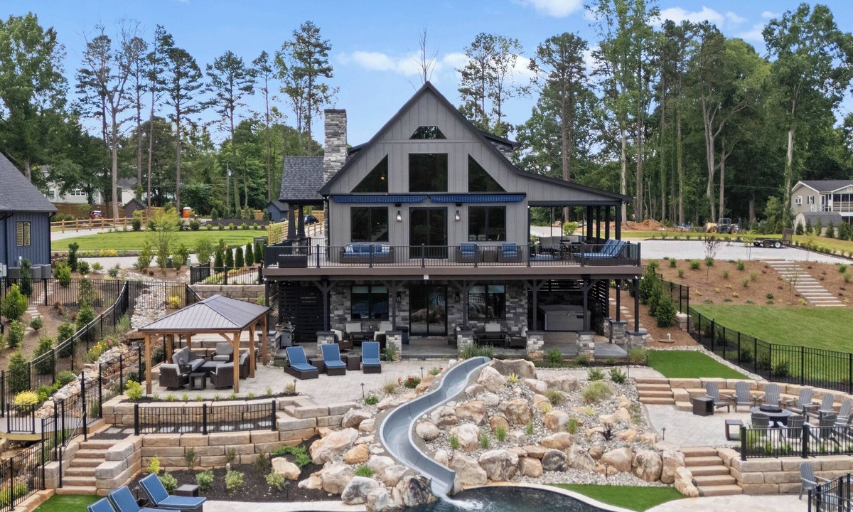 Lake Norman of Catawba House | Waterslide, Pool & Theater, Sleeps 21 | Gray Fox Lodge by AvantStay