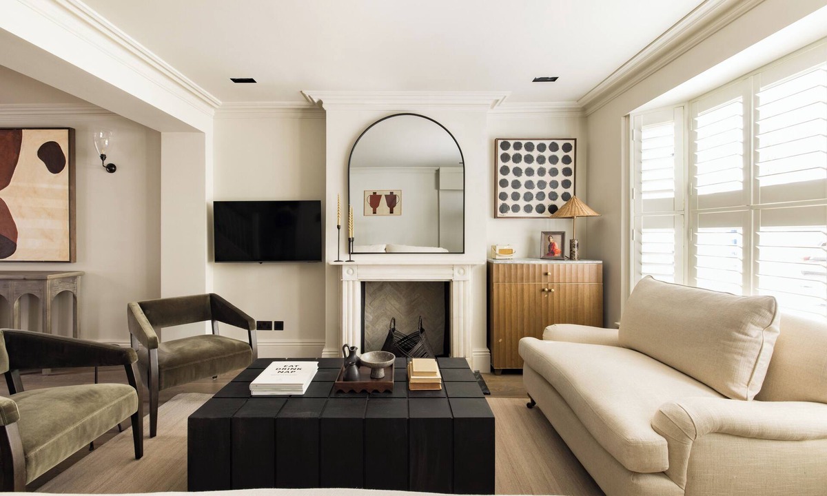 Royal Borough of Kensington and Chelsea House | Welcome to our newly renovated 4-bedroom, 2-bathroom retreat in the heart of Kensington. Warm tones, plush textures, and elegant touches create a serene space. Unique artworks and opulent accents add character throughout. Perfect getaway starts here.