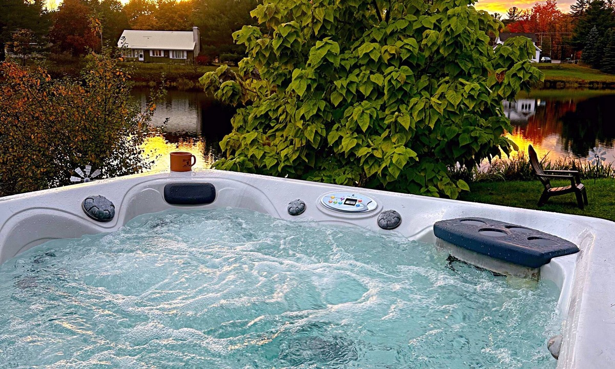 South Boardman Cabin | Welcome to Serenity Shores! 🌅 Soak in the private hot tub, unwind by the fire pit 🔥, and savor calming lake views. Pet-friendly 🐾 and perfect for recharging, exploring, and making memories.
