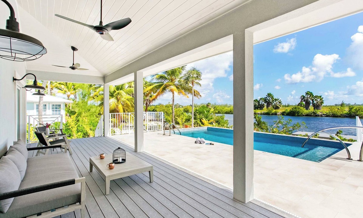 Rum Point House | Wight Away: Family Villa Near the Rum Point Club w/Private Pool, Dock, & Grilling Cabana.