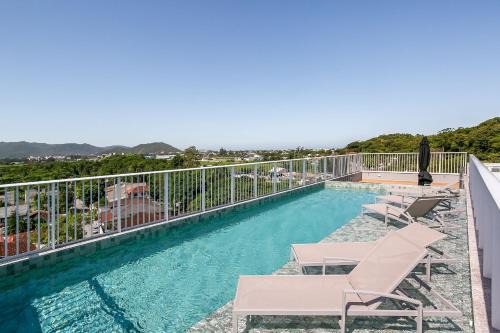 Alto Ribeirao Leste Apartment | With a beautiful view and a pool near the beaches and airport