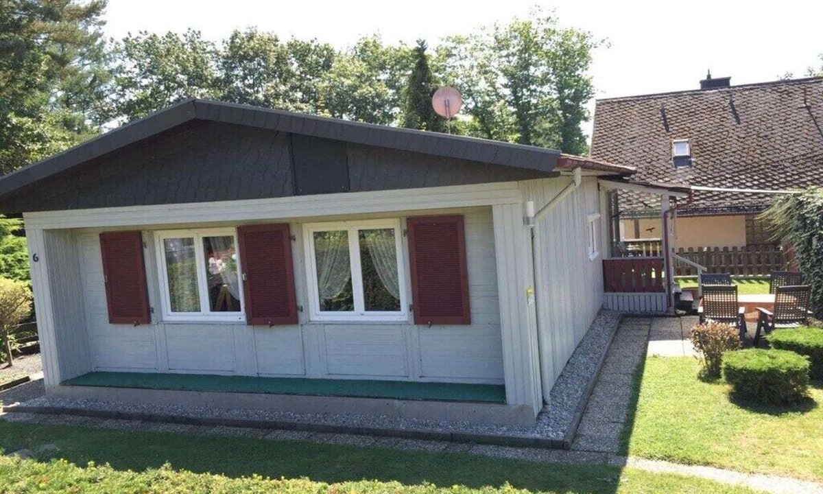 Waldsiedlung Romerstraße House | Wooden holiday home with winter garden
