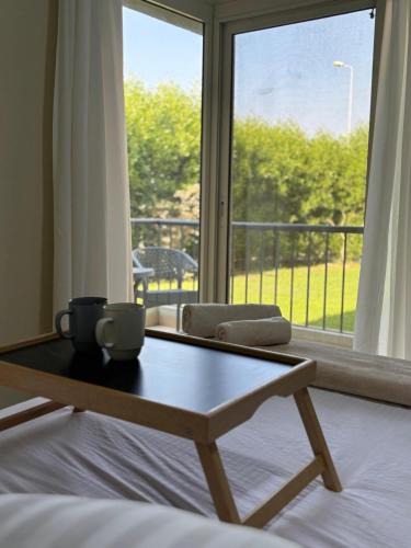 Sheikh Zayed City Apartment | Zayed Elite Retreat pool, garden & breeze