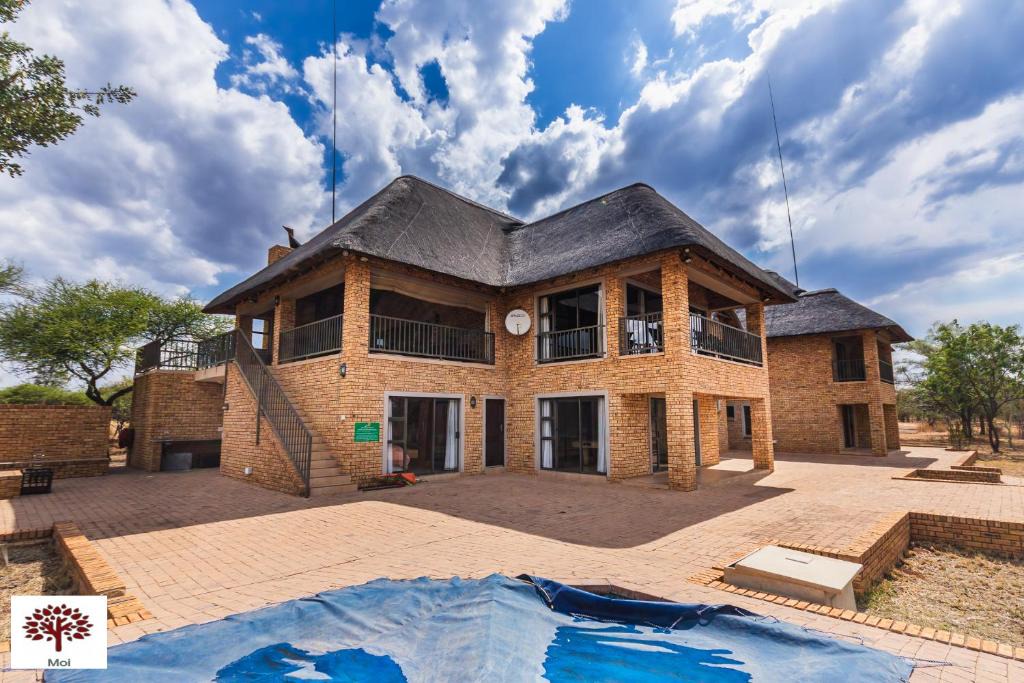Leeupoort Villa | Zebula Golf and Wildlife Estate - Spectacular View Pax 13 - Moi Signature Luxury villa