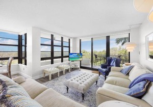 Beachfront condo with pool and wraparound balcony