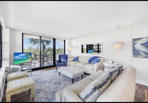 Beachfront condo with pool and wraparound balcony