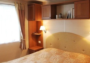 Comfort cottage in a quiet and natural campsite T03