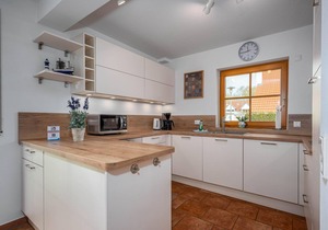Comfortable semi-detached house with terrace, garden view and heated pool -