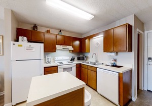 Condo Steps from the Sand with Balcony, Resort Pools, Central AC, & WiFi