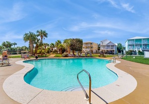 Condo Steps from the Sand with Balcony, Resort Pools, Central AC, & WiFi