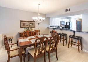 Deeded Beach Access, Community Pool, Screen Porch, Walk to Shops and Restaurants