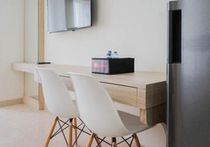 Minimalist and Homey Studio Menteng Park Apartment By Travelio