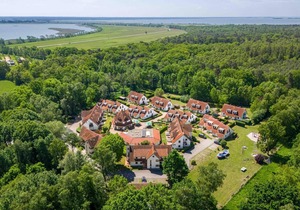 Semi-detached house with sauna, garden and heated pool in the Freesenbruch vacation park