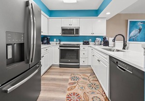 Spacious and stylish condo is perfect for a beach getaway full of adventure, relaxation, and fun.