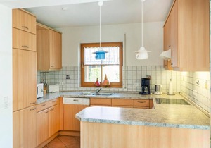 Spacious semi-detached house with garden, terrace and pool in the Zingst vacation park -