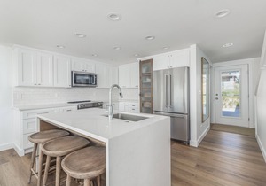 Spectacular Views from this Beachfront Home literally Steps to the Sand!