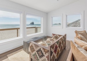 Spectacular Views from this Beachfront Home literally Steps to the Sand!