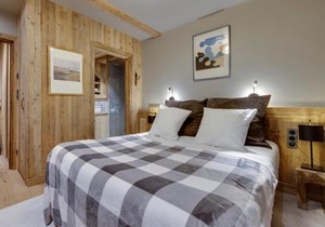 Superbe duplex 68m² avec cheminée, 2 chambres, parking intérieur, et services inclus à Val d'Isère - FR-1-567-46