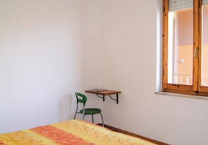 This apartment is located in a residential complex in front of the tourist port of Castelsardo, in S