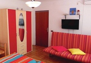 This beautiful and simply furnished apartment is located on the first floor of a family house in the