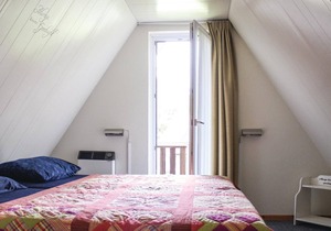This beautifully situated vacation home is located on the waterfront in a welcoming vacation park in