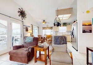Waterfront home with views of channel, expansive covered deck, & 2 pools