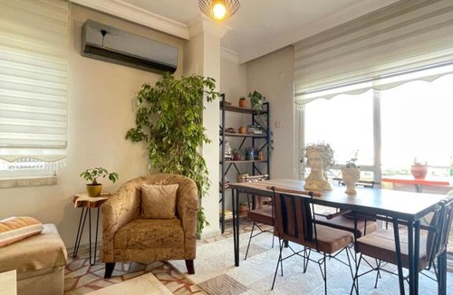 Palmiye Mahallesi Apartment | Şehrin kalbindeki deniz manzaralı 3+1 ev