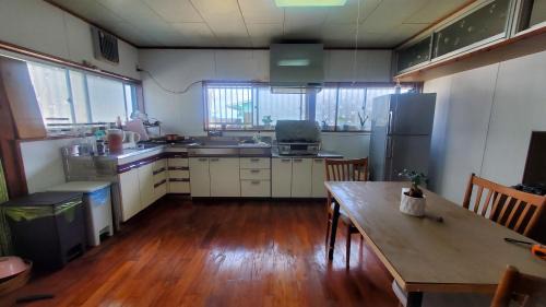Amami Hostel | 一棟貸し 喜瀬しーばなゲストハウス -Traditional House Rent-