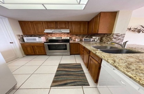 Vanderbilt Beach Condo | 1 bedroom plus STUDIO on Vanderbilt Beach. Beach access, water views. Sleeps 4