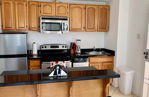 Kittian Village Condo | 1 king bed beachside condo