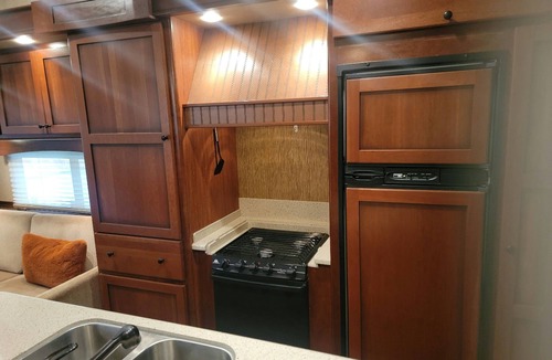 Tia Juana House | 1 mile East of Disney, safe fenced property, lots of room for trailers and rigs!
