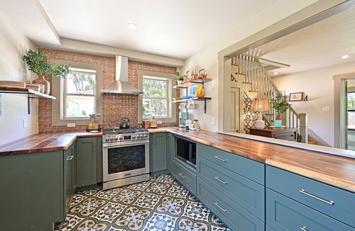 River District House | 100 yr old Stone House with a heated pool 9 mi to beaches & 2 mi to downtown