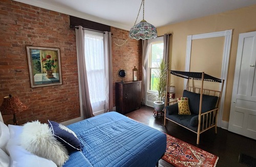 Elmira Apartment | 10ft ceiling, brick exposed apartment w/ artistic feel