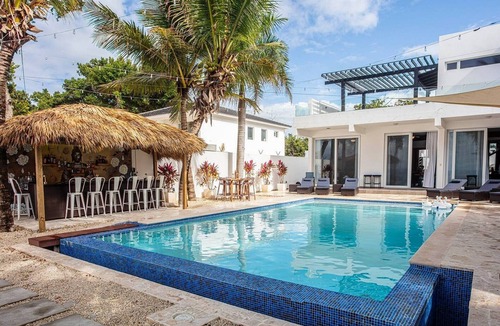 Los Charamicos Villa | 11BD complex w/pool & parking, steps from the beach