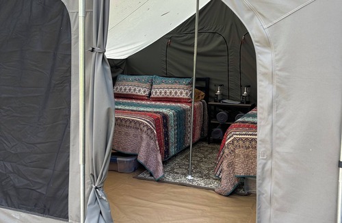 Three Rivers RV Rental | 12x12 Cabin Tent. camping with a little luxury.
