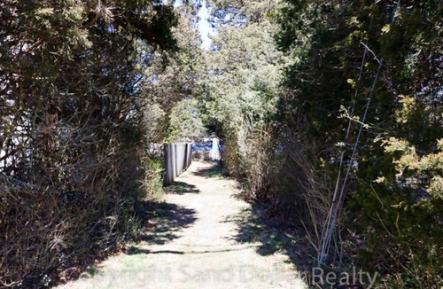 Bourne House | 14 Benedict Rd - Marshside Beach Retreat: 3BR, Nature Views, Pet-Friendly