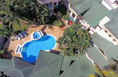 Villas Ana Maria Apartment | 1BD chica-friendly condo steps from clubs, free breakfast, pool/AC/TV/wifi!