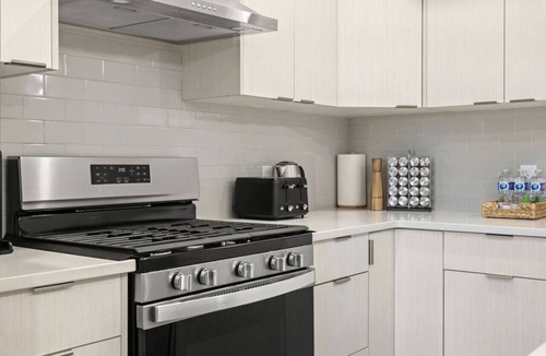 Sage Hill Apartment | 1BR Walk Out Suite » Backyard » Patio » 65” TV