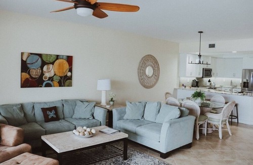 Vanderbilt Beach Condo | 1st Floor Condo Direct Bay/Gulf Beach Views! Steps To Beach!