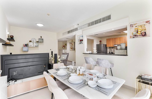 Dubai Sports City Apartment | 2-Bedroom Haven with Canal View near The Els Club