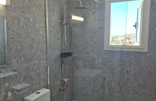 Peyia Town Apartment | 2 bedroom top floor apartment, stunning views, Aircon, 2 pools, Free WIFI