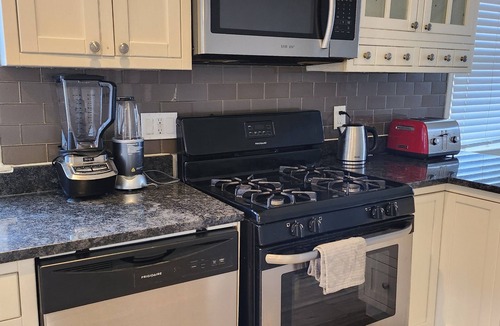 West Baltimore House | 2-bedroom townhome in superb Baltimore with parking and gated yard